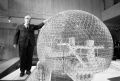 Buckminster-fuller-with-a-model-of-the-biosphere-for-the-canadia-the-harrington-collection.jpg